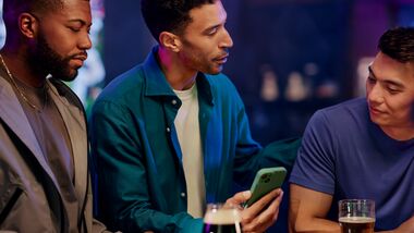 woman placing bet at sportsbook counter